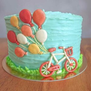 Bicycle & Balloons Theme Cake – Whimsical Birthday Celebration